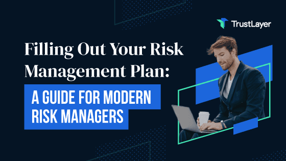 A modern risk manager reviewing a comprehensive risk management plan on a laptop while holding a coffee mug.
